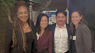 Kasey Archey of EAH Housing stands with colleagues at a SCANPH event, smiling together in a welcoming indoor setting following her appointment to the organization’s Board of Directors.
