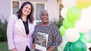 Community members and partners gather for a ribbon-cutting ceremony at Mission Paradise Apartments in Hayward, celebrating the opening of an affordable housing community by EAH Housing.