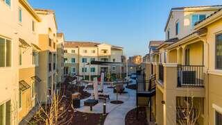 Exterior courtyard photo of Avena Bella II
