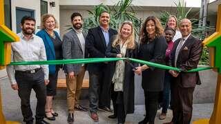 Elected officials and partners at the Pointe on La Brea ribbon cutting celebration