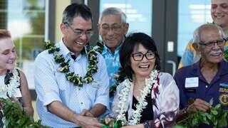Man and woman smiling after maile untying ceremony (Hawaiian blessing)