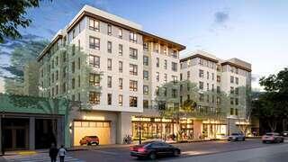 Artist rendering of exterior close-up of 4th street in Santa Monica in evening light on a bustling street.