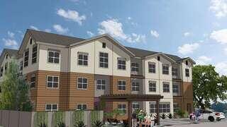 Artist rendering of La Loma exterior: 3 story building.