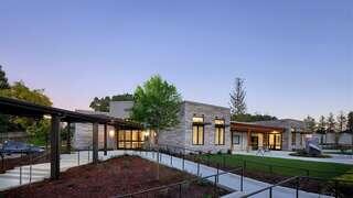 Fellowship Plaza provides senior affordable housing by EAH Housing with landscaped courtyards and accessible pathways
