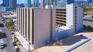 Ola Ka ʻIlima Artspace Lofts features an affordable housing community managed by EAH Housing with contemporary midrise design, urban setting, and proximity to downtown Honolulu.